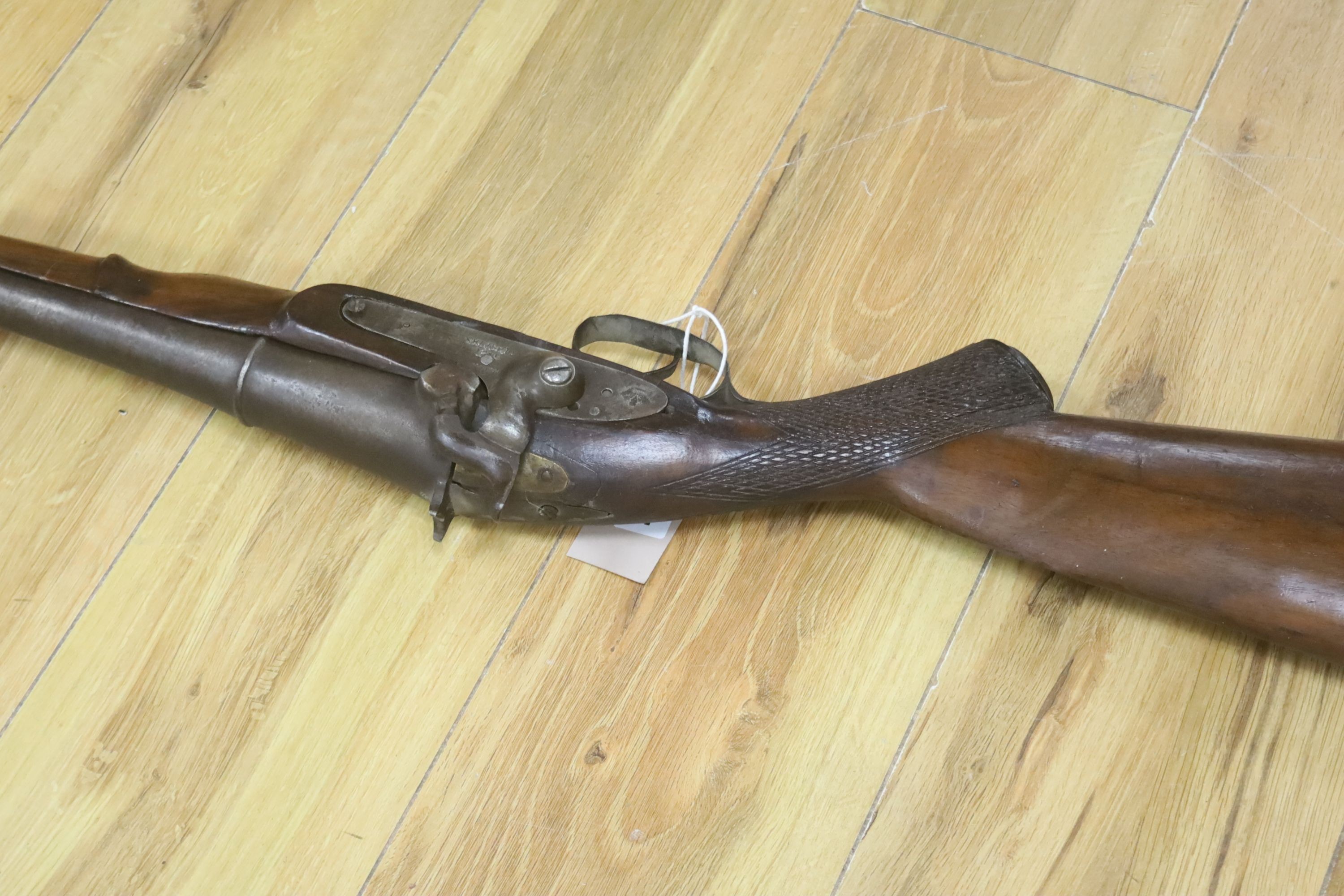 A 19th century percussion musket with walnut stock and ramrod, 158cm